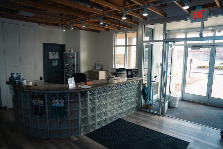 Club Five V wall and meeting space at Club Five Health in Green Bay, WI