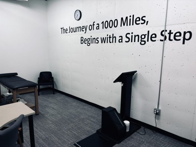 Journey of a thousand miles wall art at Club Five Health in Greenwood Village, CO